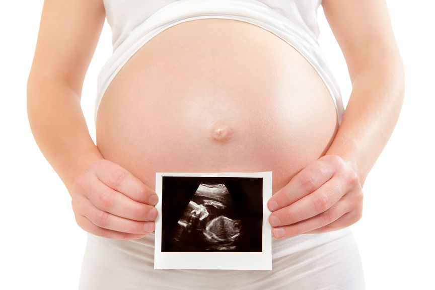 Babybauch mit einem Ultraschallbild 