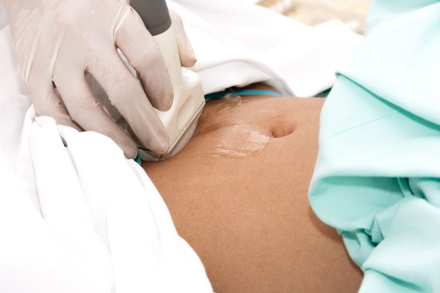 Ultraschalluntersuchung am Unterbauch,Ultraschalluntersuchung einer Schwangeren